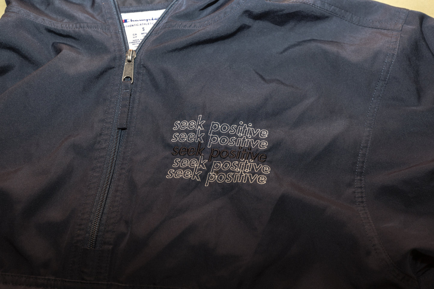 SEEK POSITIVE CHAMPION TRACK JACKET